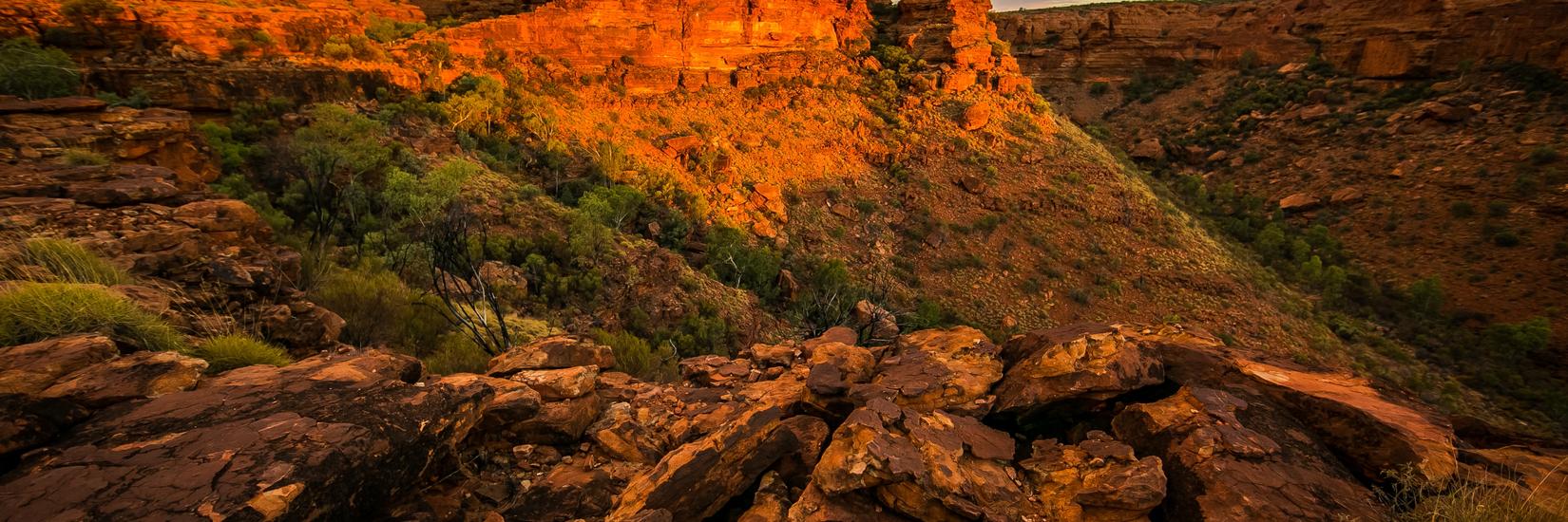 Red rock cliffs glowing in the evening sun